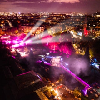 Aerial photo of lights beaming throughout Botanic Gardens