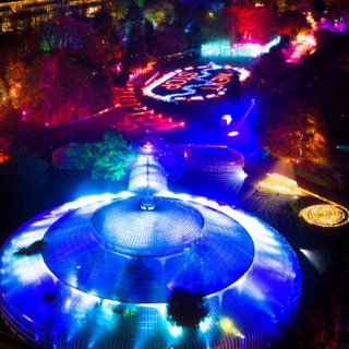 Aerial photo of Kibble Palace illuminated at night